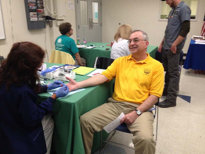 Employee attends wellness fair hosted by Seaway Bolt & Specials Corporation, special bolt & pipe plug manufacturer